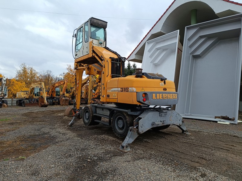 2009, Liebherr A316 - imagine 4